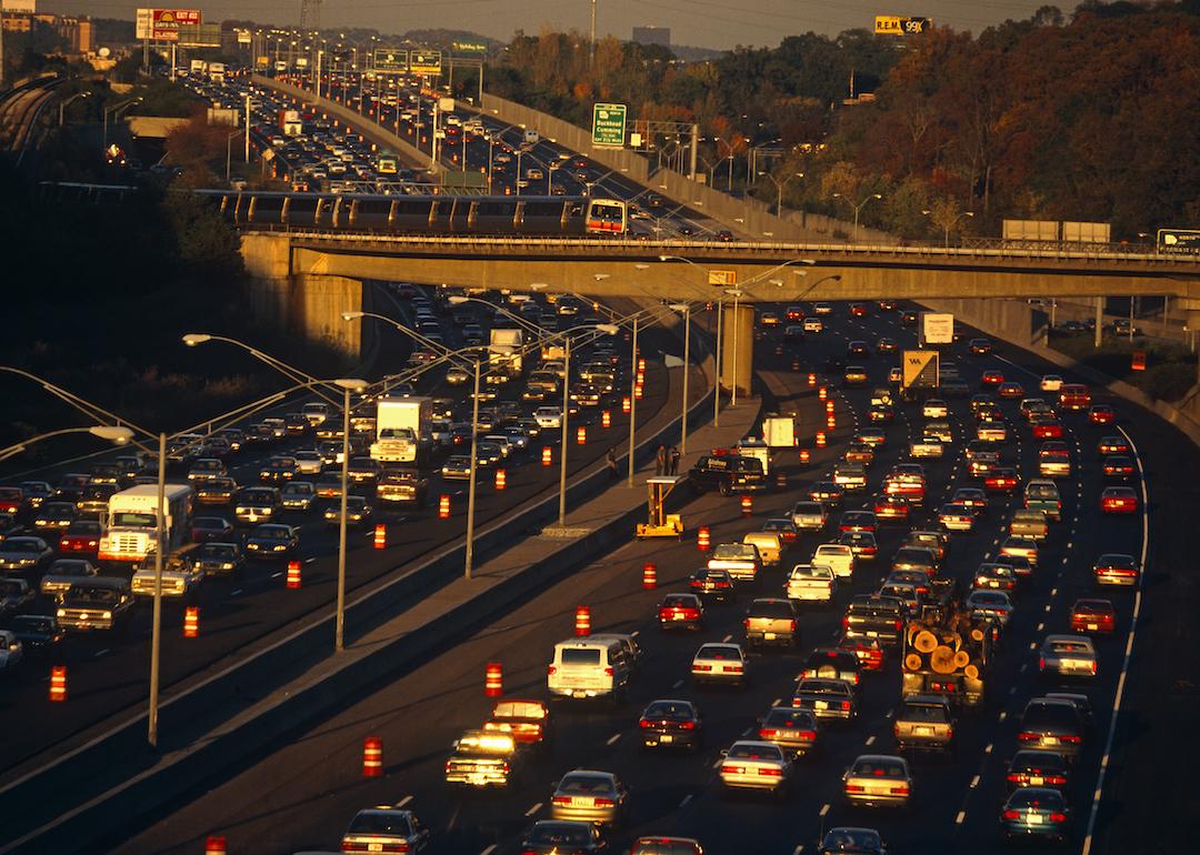 Near the junction of the 400 to Buckhead, the 401 highway divides and splits during afternoon rush-hour traffic which slows and builds up so that vehicles and cars back-up as they head home and out of Downtown Atlanta, Georgia.