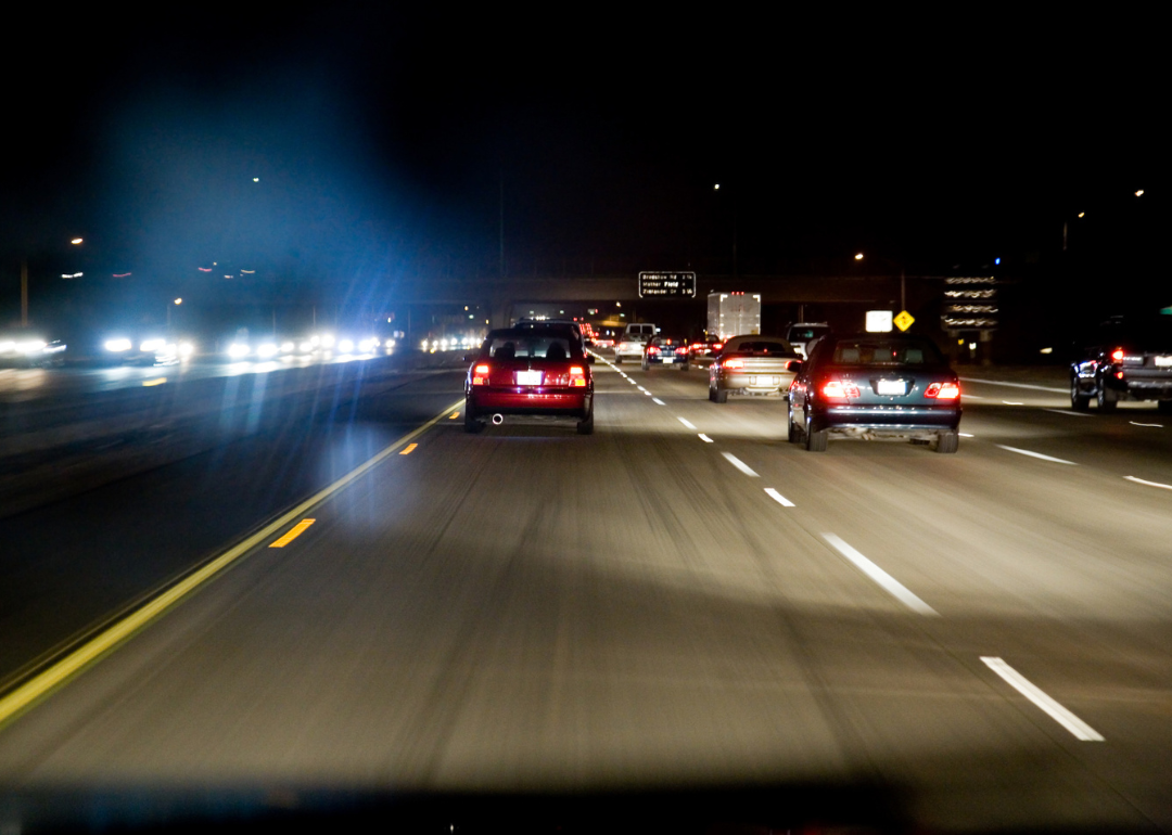 A freeway at night in traffic