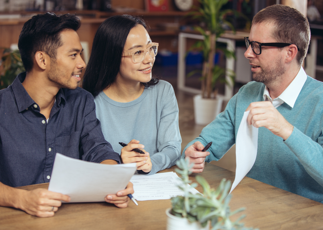 A couple discusses a home equity loan with loan officer