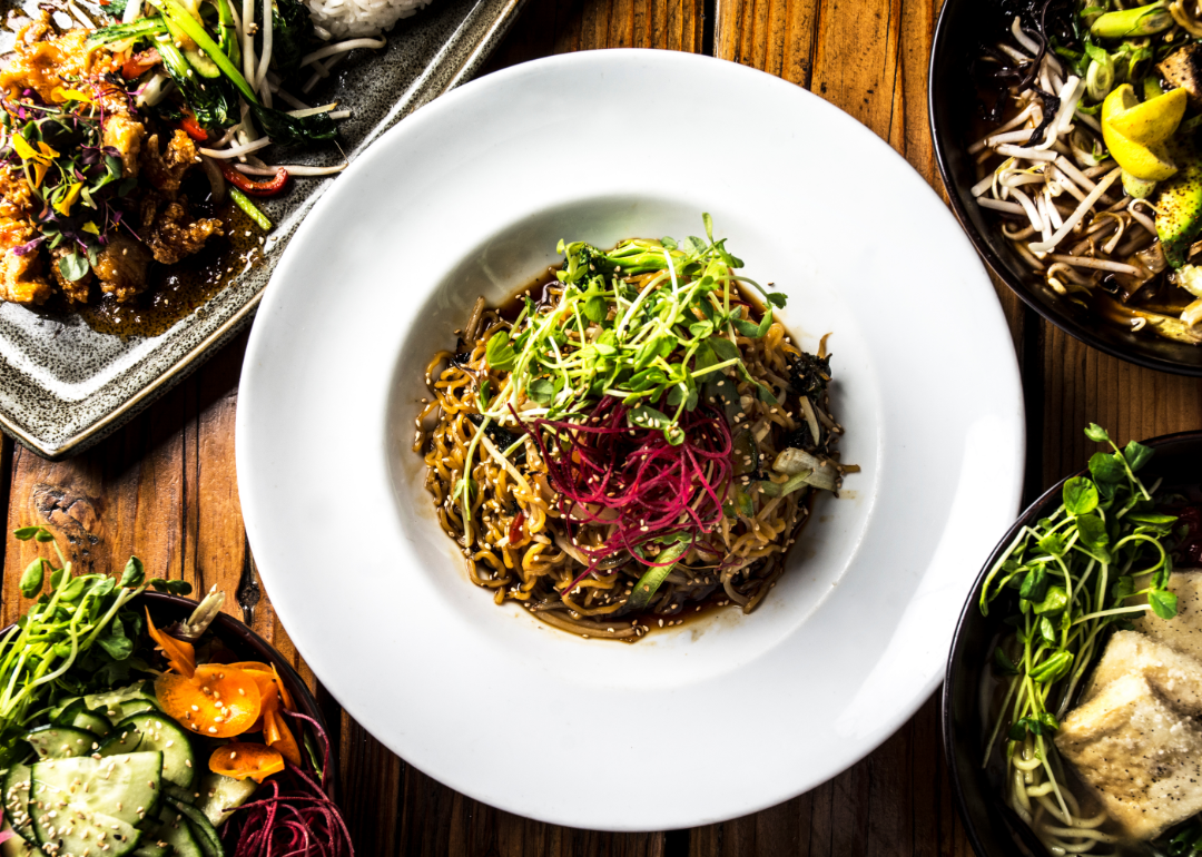 A selection of five vegan dishes on a table.