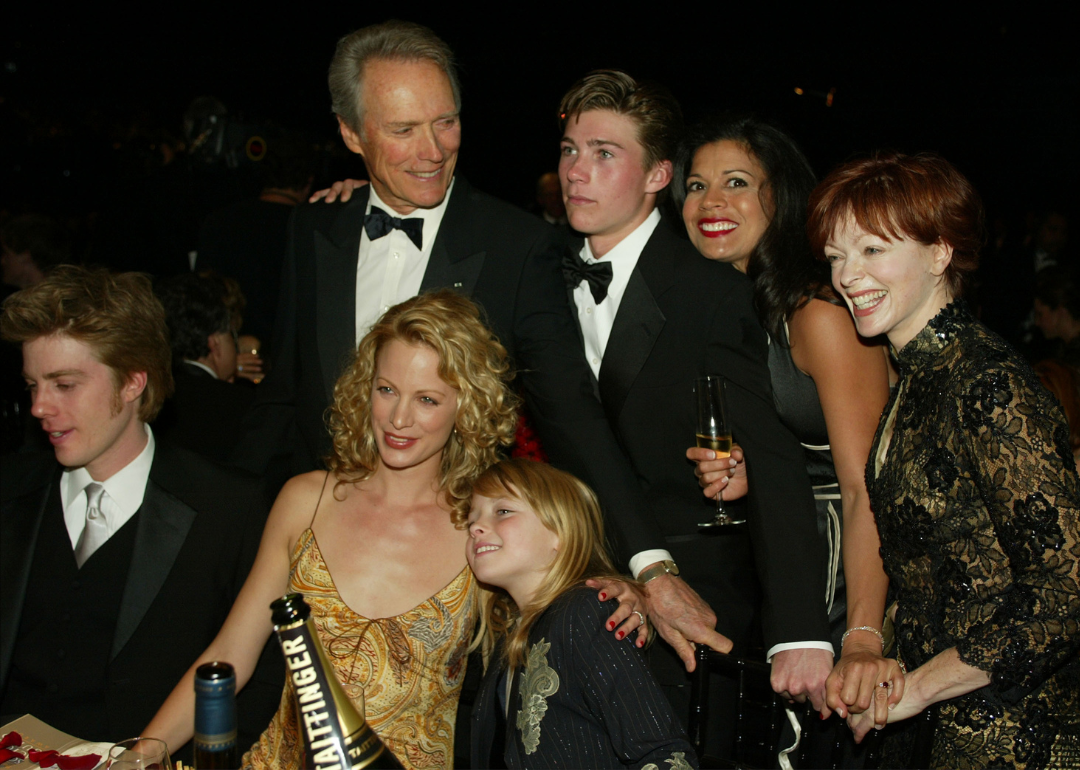 Actor Clint Eastwood and wife Dina Ruiz (R) pose with family and friends during the 9th Annual Screen Actors Guild Awards at the Shrine Auditorium on March 9, 2003 in Los Angeles, California. 