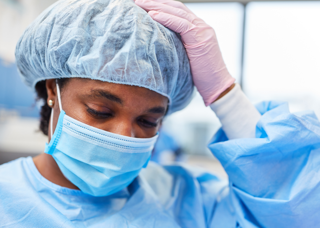 Closeup of an exhausted operating room nurse.