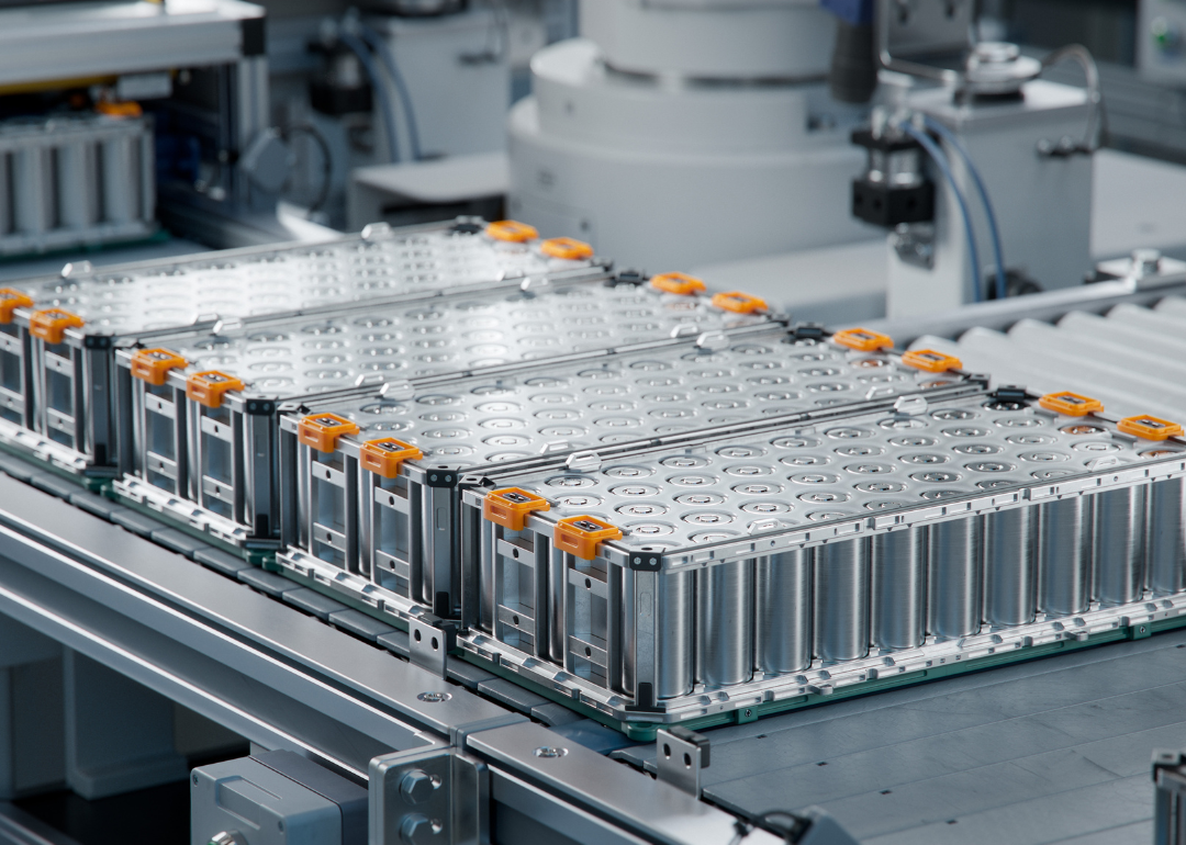Lithium-ion High-voltage Battery Component for Electric Vehicle or Hybrid Car. Battery Module for Automotive Industry on Production Line. High Capacity Battery Production inside a Factory.