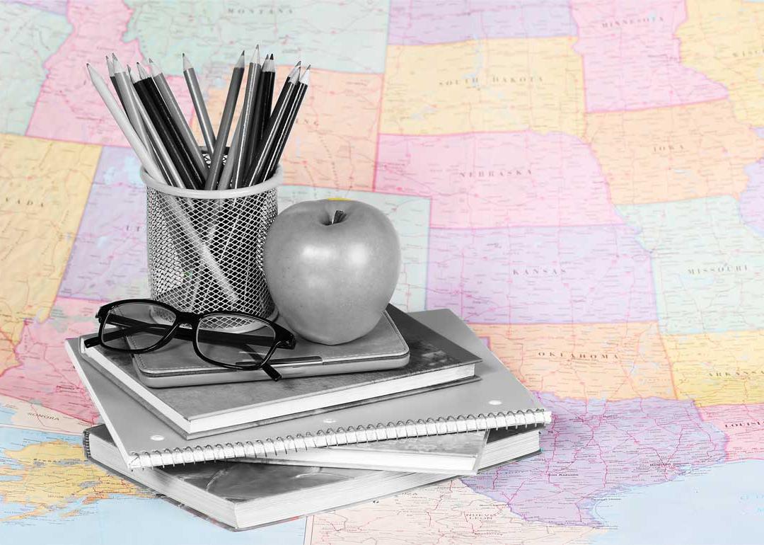 photo illustration U.S map with grayscale teaching materials placed on topced