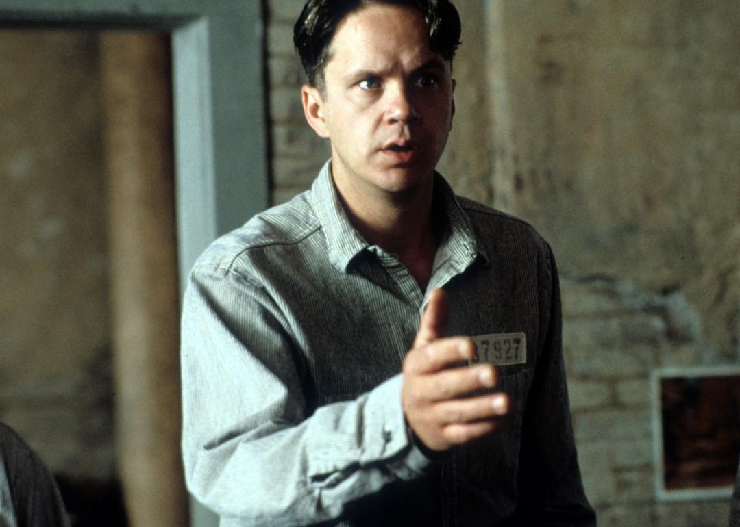 Actor Tim Robbins extends his hand in a scene from the 1994 film 'The Shawshank Redemption.'