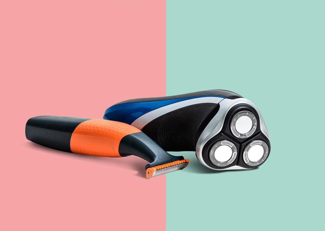 razor next to electric razor in front of a pink and light green background