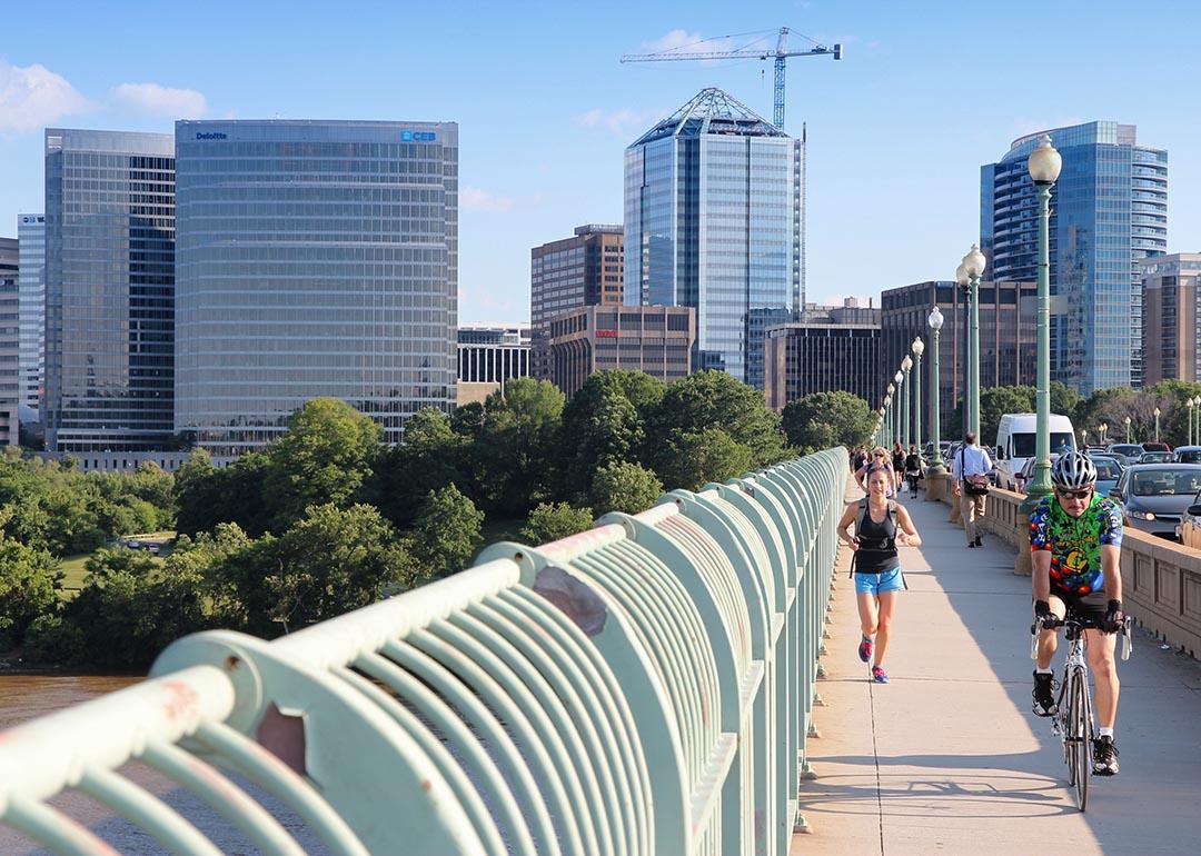 People crossing the Key bridge between Arlington, VA and Washington D.C.