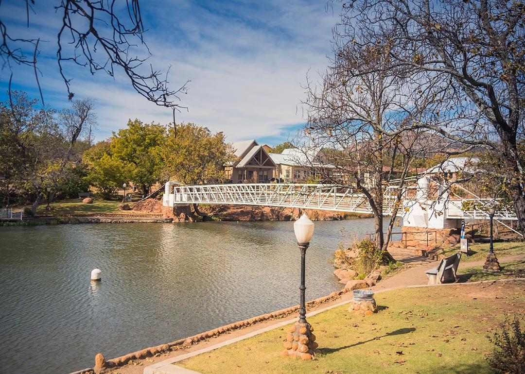 View of bridge over river in a park Lawton, Oklahoma.