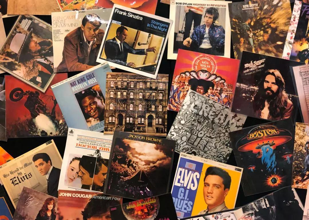 A collection of vintage pop and rock vinyl record covers.