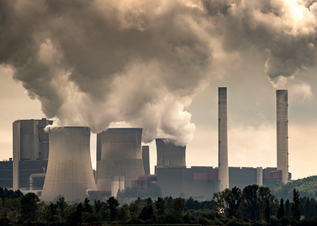 Chimneys at a coal power plant emitting smoke