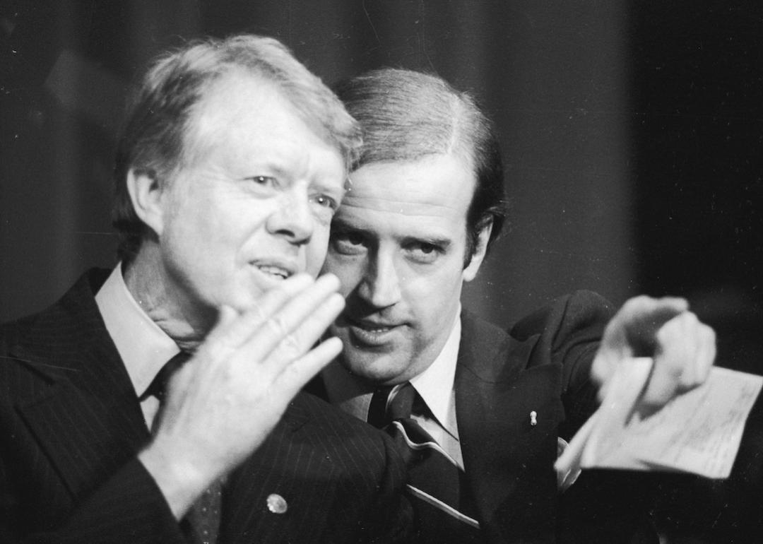 Then-Senator Joe Biden points at the crowd to President Jimmy Carter during a fundraiser in 1978.