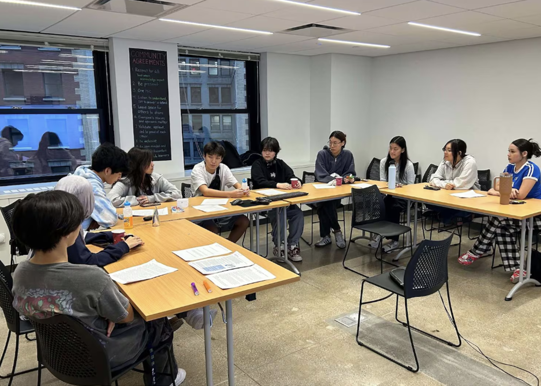 Photo showing students in the Asian American Student Advocacy Project meeting.