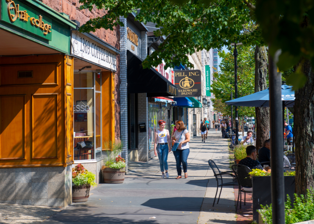 Historic commercial buildings on Massachusetts Avenue at Inman Street in the city center of Cambridge, Massachusetts MA, USA.