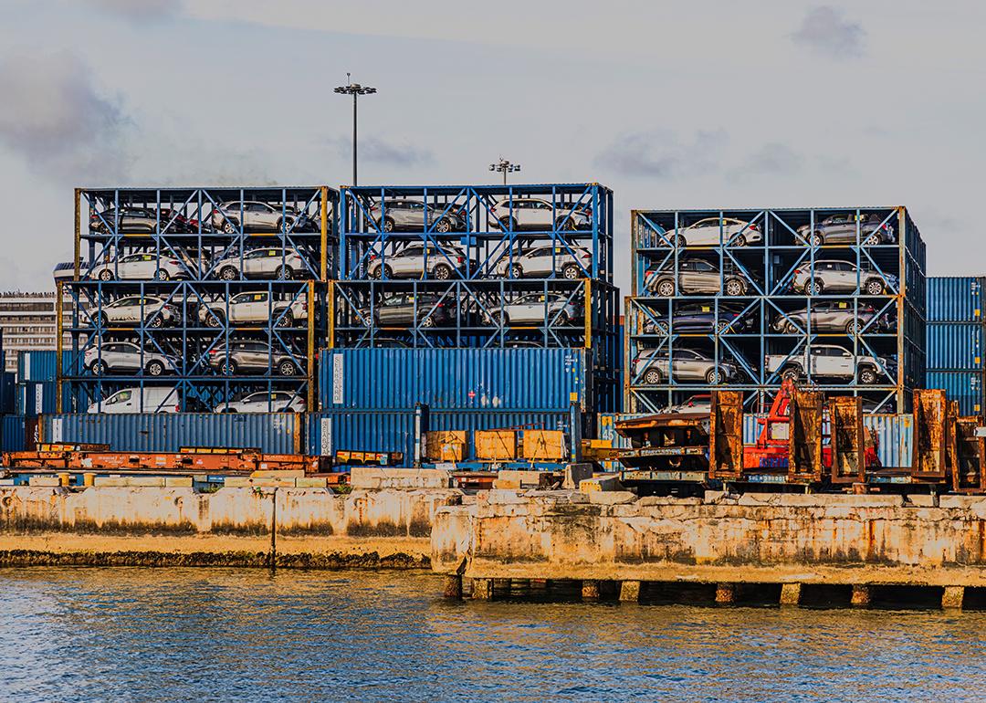 Port Miami with imported cars stacked in metal containers.
