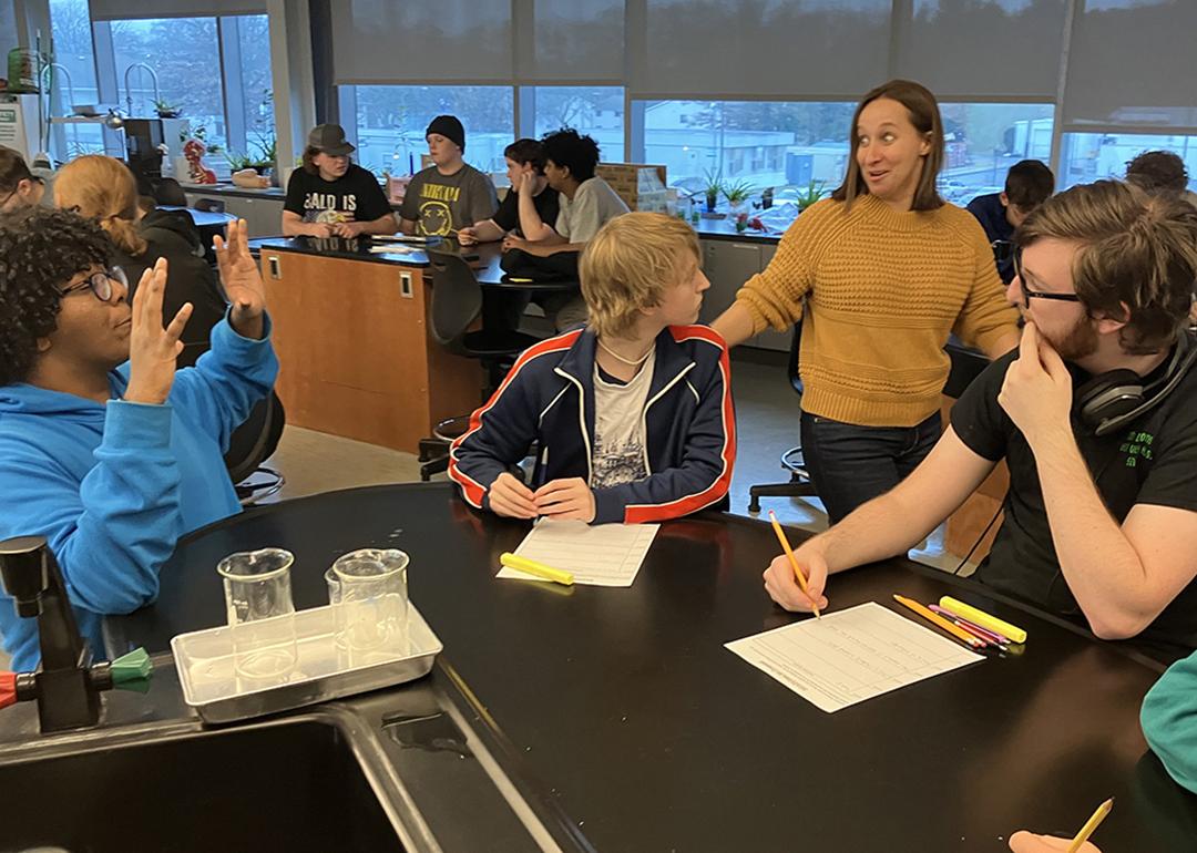 Tech Valley High School English teacher Catherine Eisele (center) leads an impromptu discussion with students during a class.