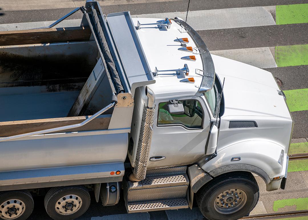 A large semi truck crossing a pedestrian lane.