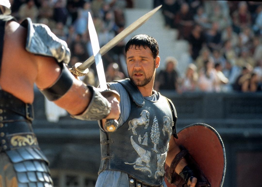 Russell Crowe faces off against another man in a scene from the film “Gladiator."
