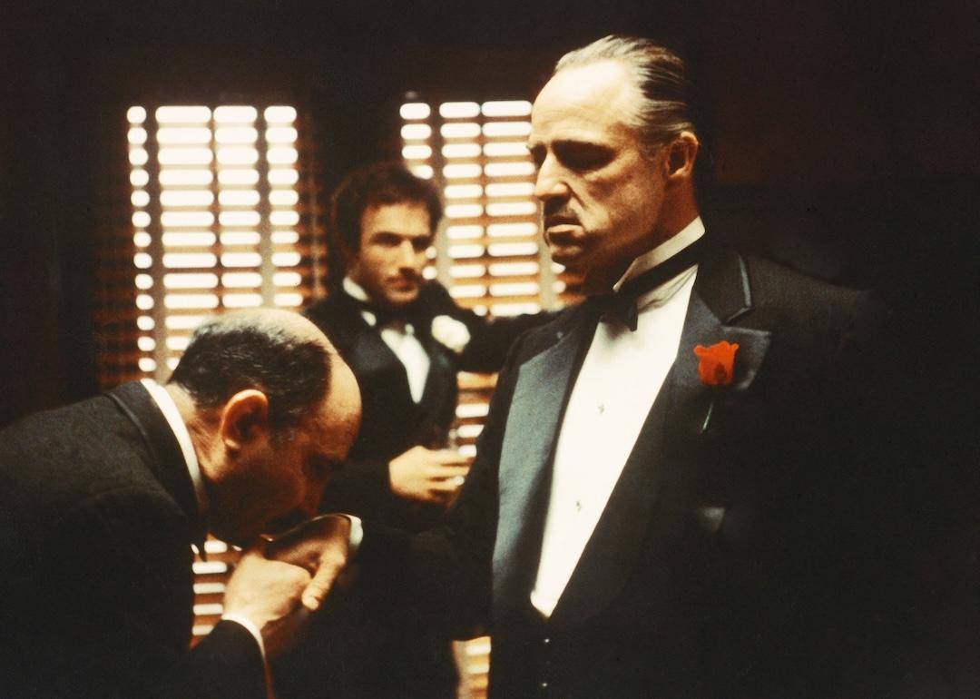 Salvatore Corsitto as Bonasera, James Caan as Sonny Corleone, and Marlon Brando as Don Vito Corleone in "The Godfather."
