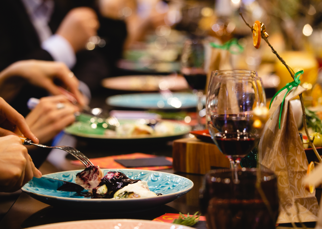 Diners eating in an elegant restaurant.