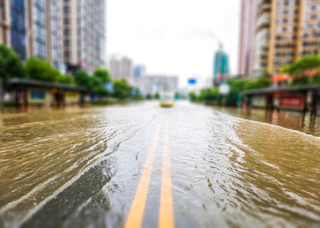 A flooded street leading to downtown.