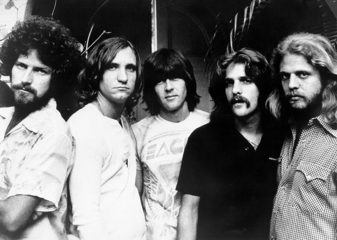 Don Henley, Joe Walsh, Randy Meisner, Glenn Frey, and Don Felder of the rock band  the Eagles pose for a portrait in 1977. 