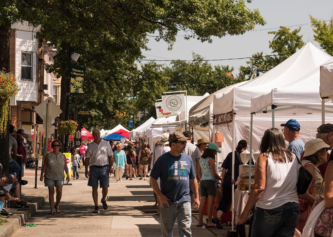 Customers and vendors at The Collingswood Craft and Fine Art Festival in New Jersey.