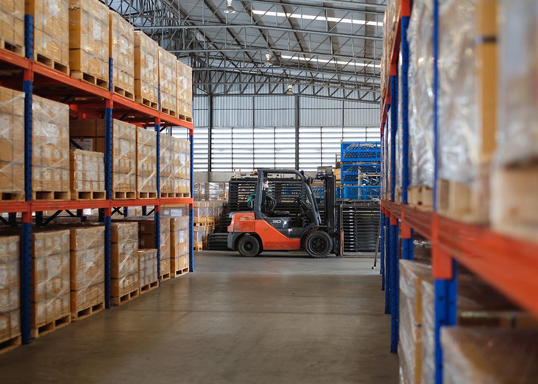 Interior of a modern auto parts factory or warehouse.