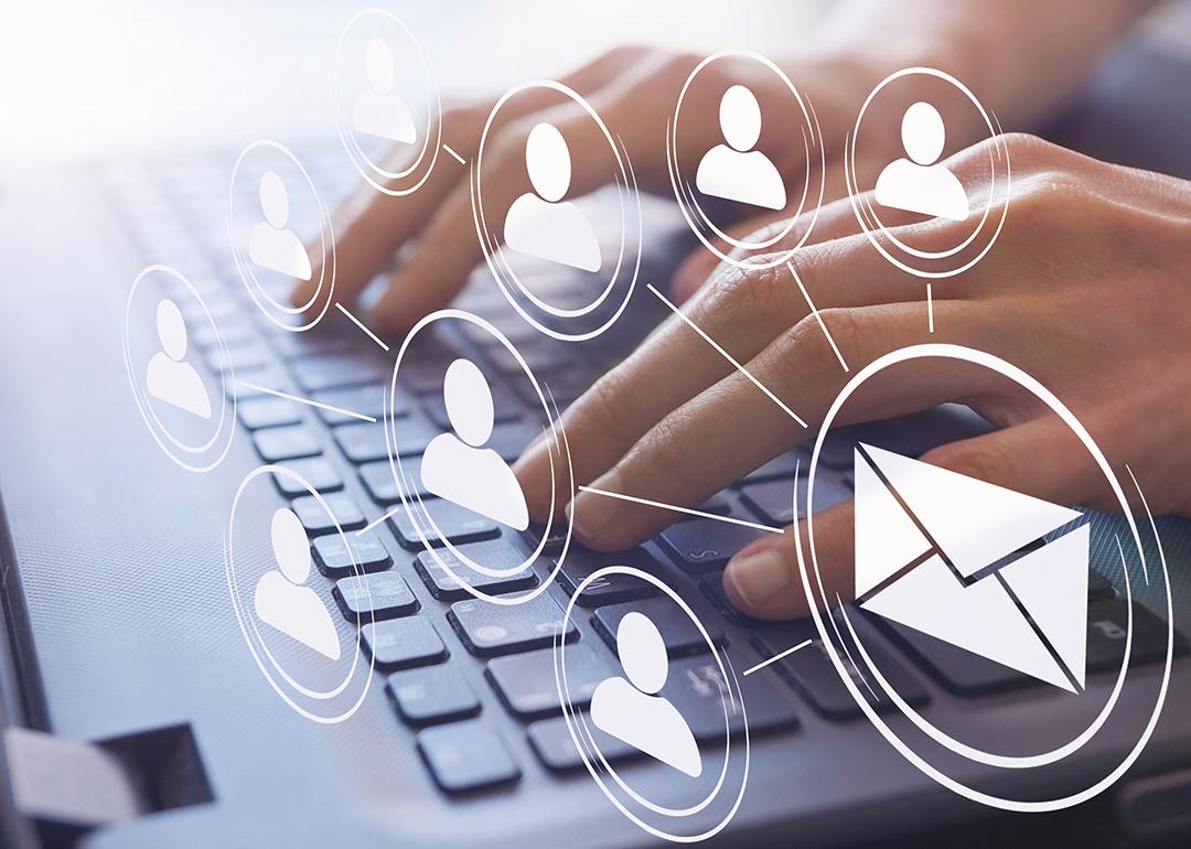 Hands typing on a keyboard illustrated with email and figure icons.
