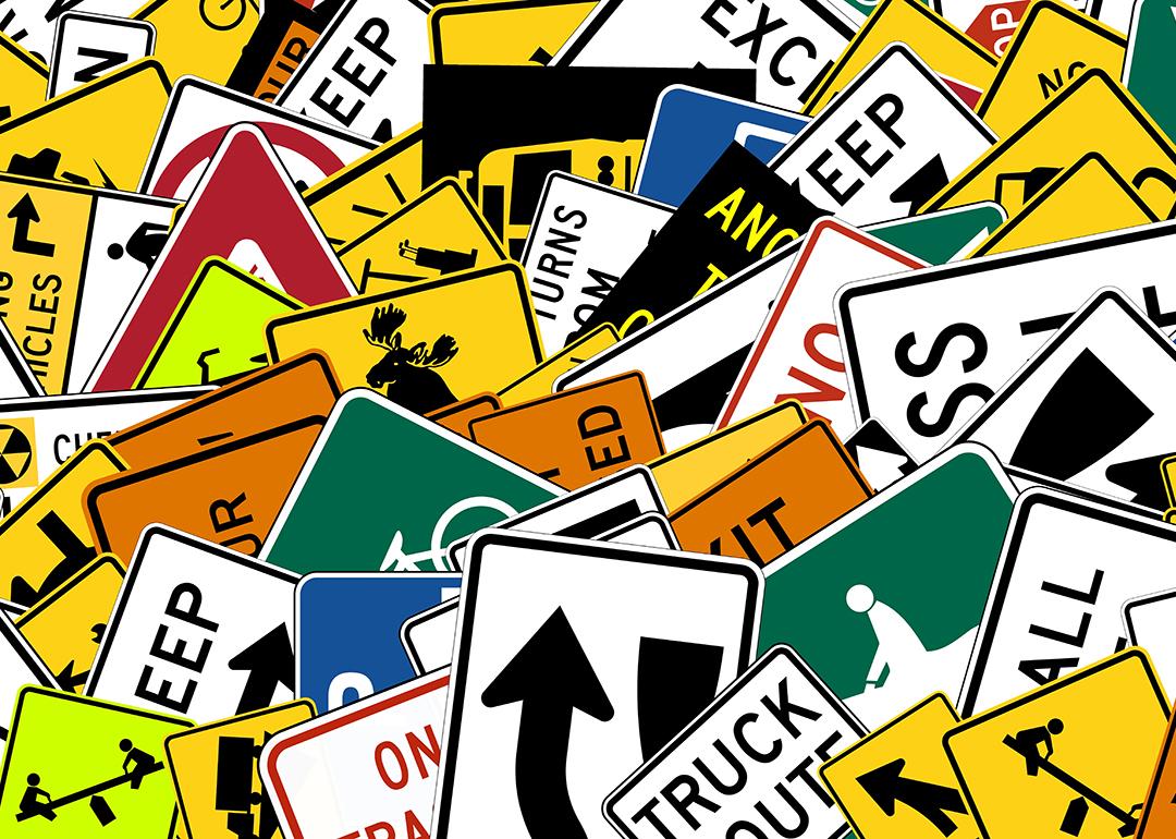 Collage of stacked road signs.