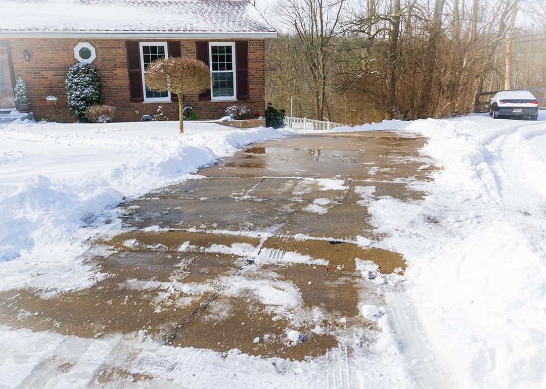 Long, steep, driveway in Kentucky after snow storm, all cleaned up with shoveling and salting. 