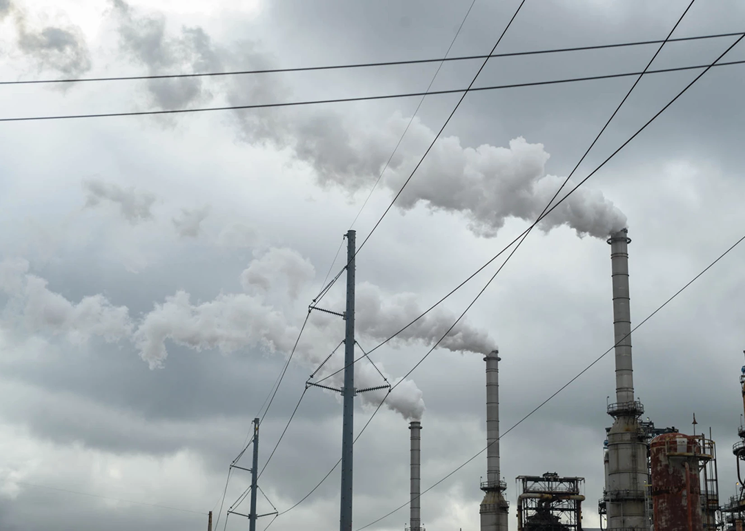 Plumes of smoke rise from three towers at Westlake Chemical's plant in Lake Charles, La. where President Donald Trump recently granted the facility a two-year exemption from stricter air quality standards. Experts say the move will increase toxic and greenhouse gas emissions for the surrounding neighborhoods. 