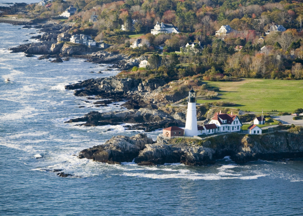 Aerial view of scenic lighthouse.