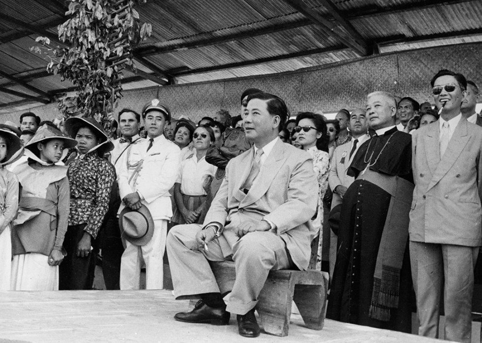 Ngo Dinh Diem seated with crowd.