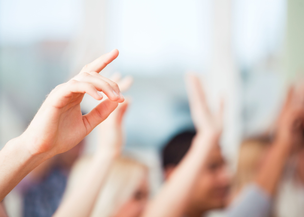 Hands raised in class