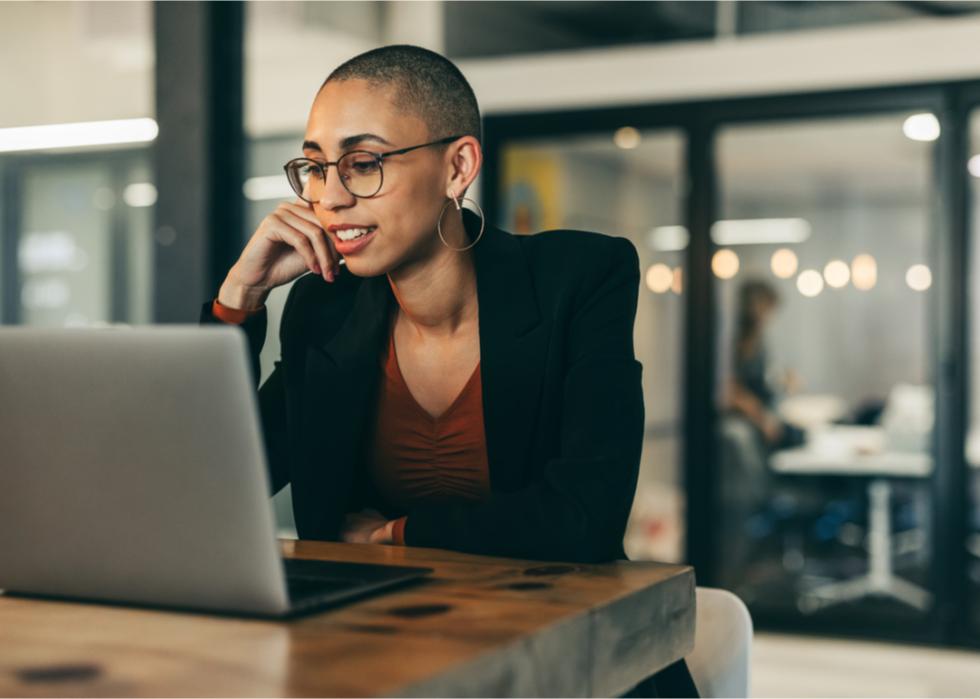 Confident businessperson speaks on videoconference.