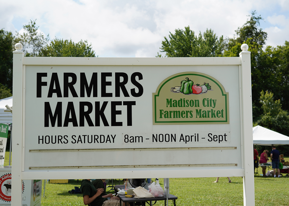 Sign advertising Madison farmers market.
