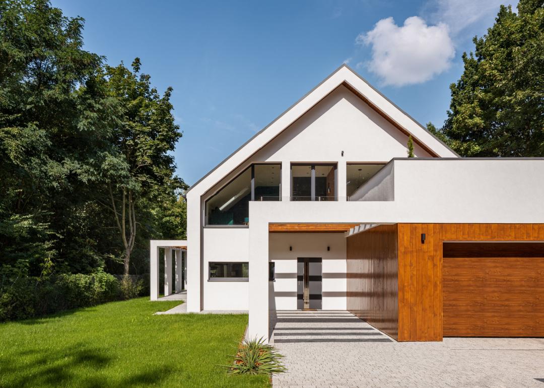 Exterior of white minimalist modern home.