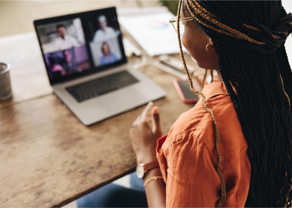 Professional participates in virtual meeting.