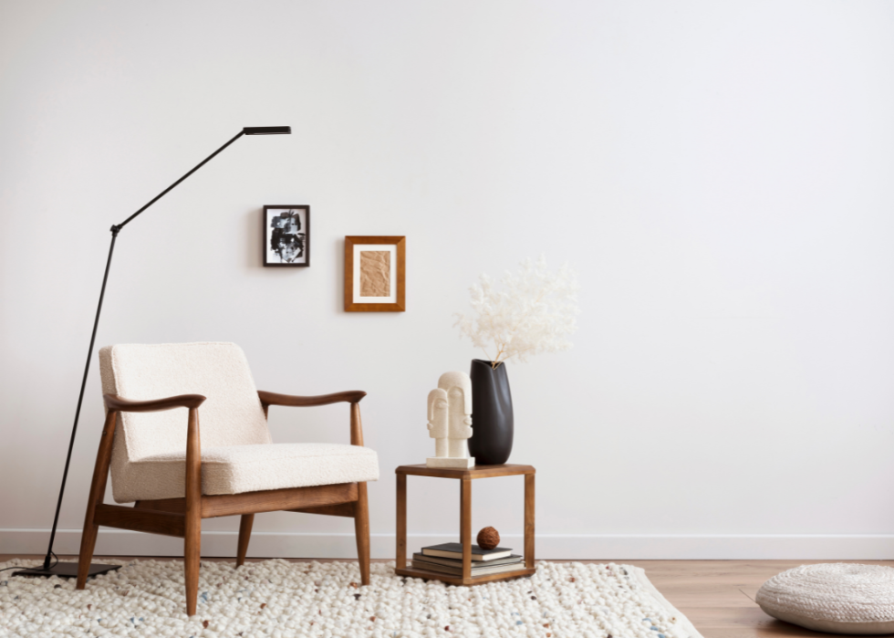 Upholstered Danish midcentury teak armchair.