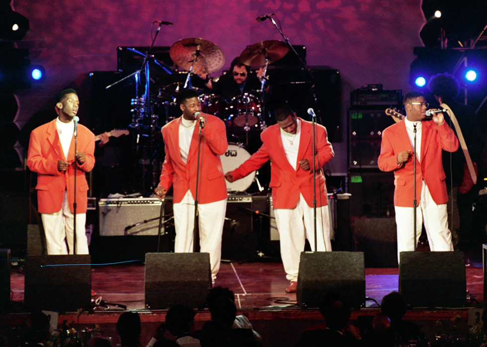Boyz II Men perform onstage.