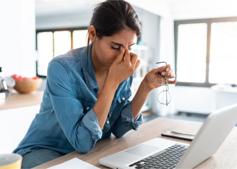 Stressed business woman working at home