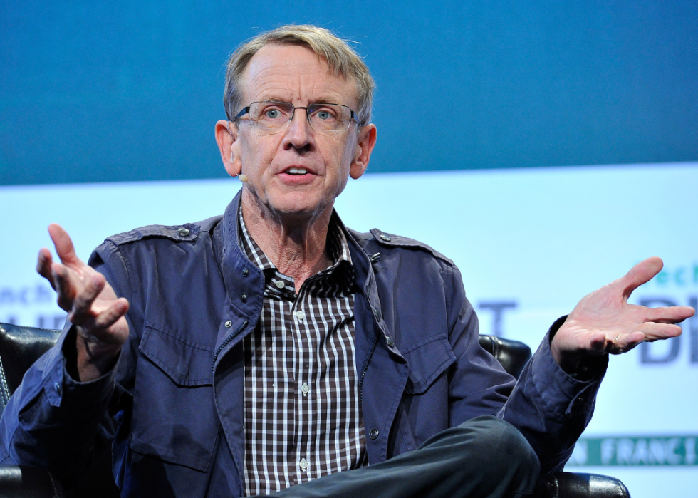John Doerr speaks onstage at event