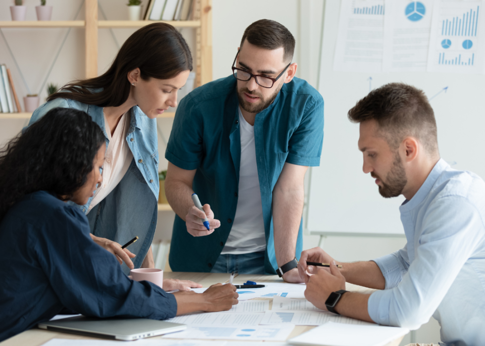 Businesspeople working in a meeting.