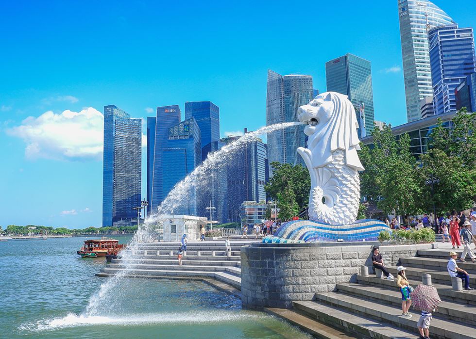 People visit the merlion fountain in Singapore.