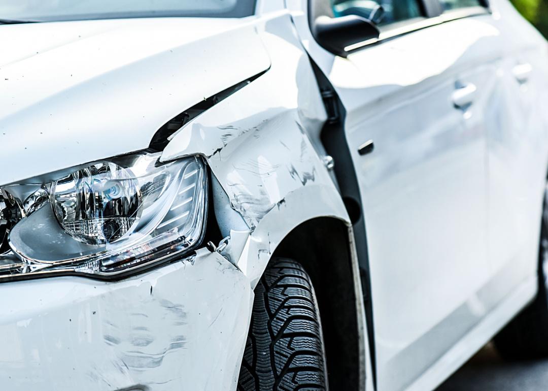 Close-up view of damage to a vehicle after a crash.
