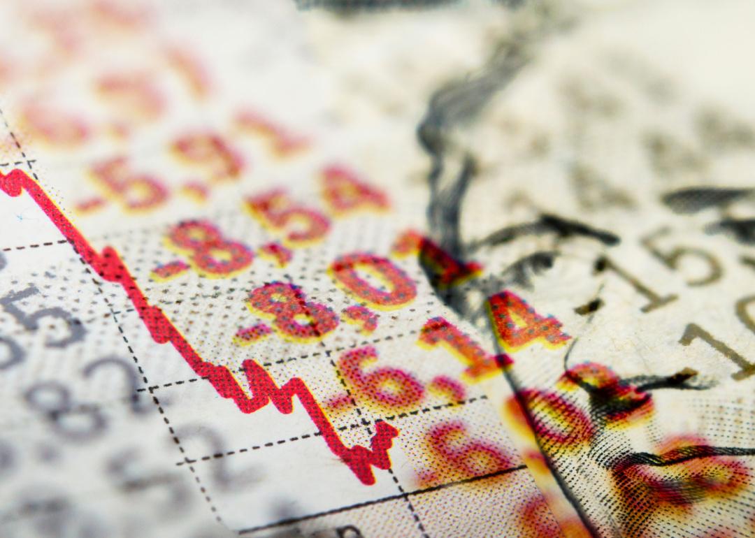 Stock market graph and dollar bill