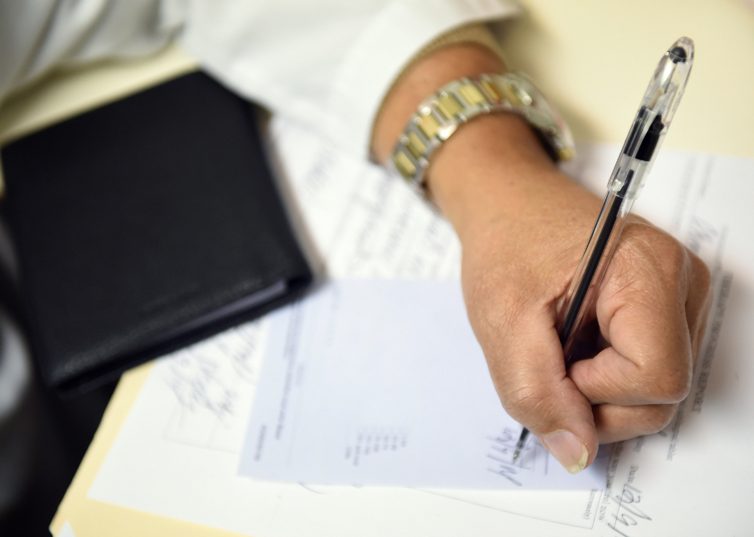 Doctor writing a prescription.