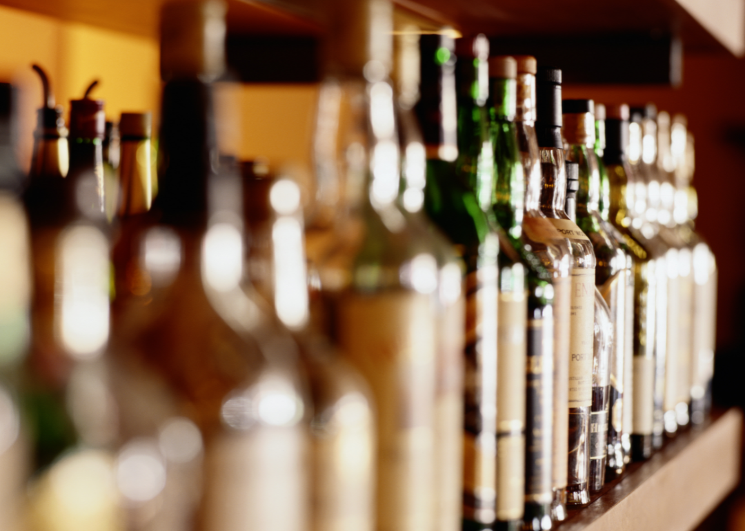 Liquor bottles close up.