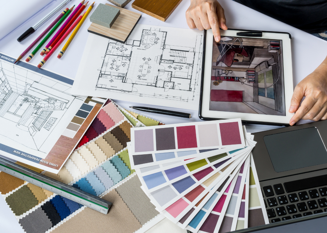 Person reviewing plans and materials.