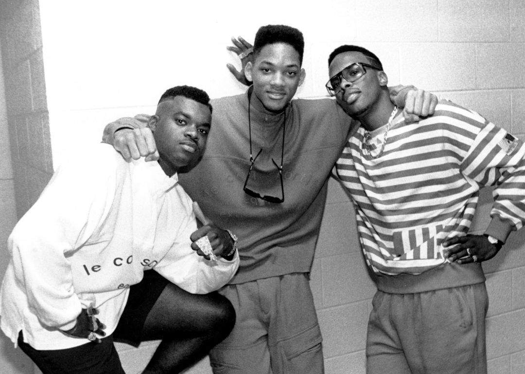 Will Smith, DJ Jazzy Jeff and Ready Rock C pose backstage.